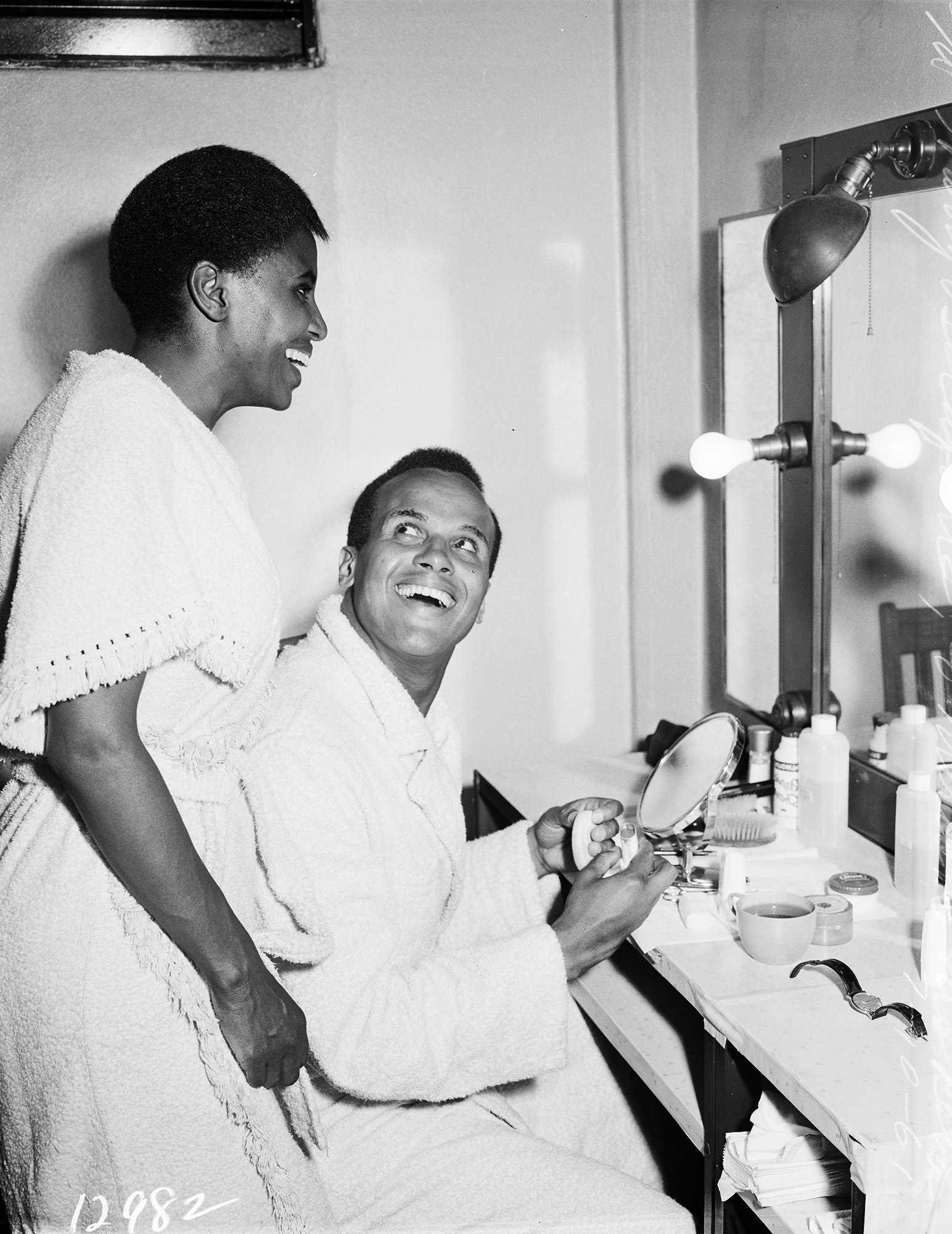 Miriam Makeba and Harry Belafonte at their opening run at the Greek Theater in Los Angeles, July 10, 1961. Photo via <i>Los Angeles Examiner</i>/USC Libraries/Corbis via Getty Images.
